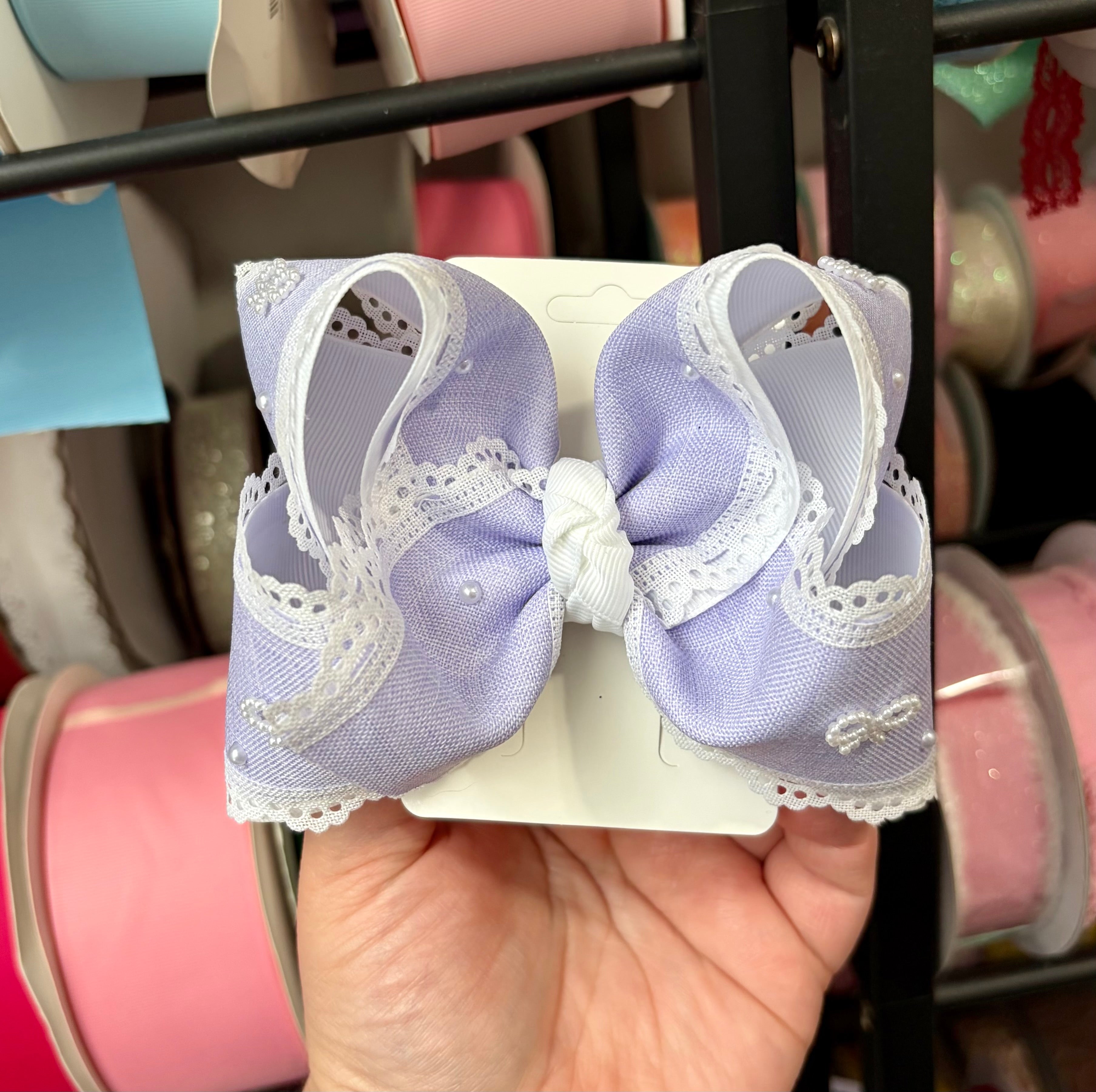 4.5” Purple bow pearls